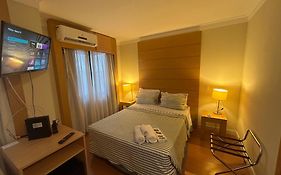 Hotel E suites em frente ao Aeroporto com ar e piscina 1714